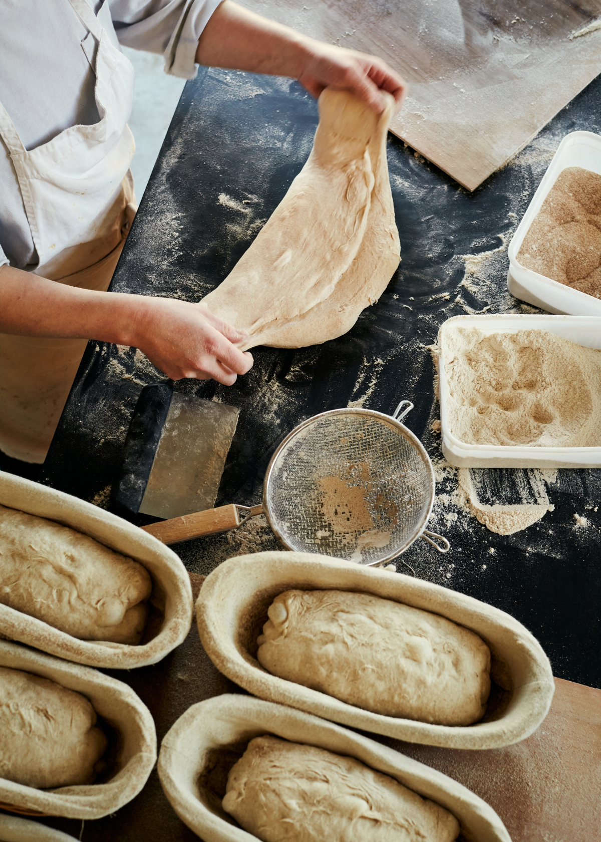 Polly shaping bread at Siding